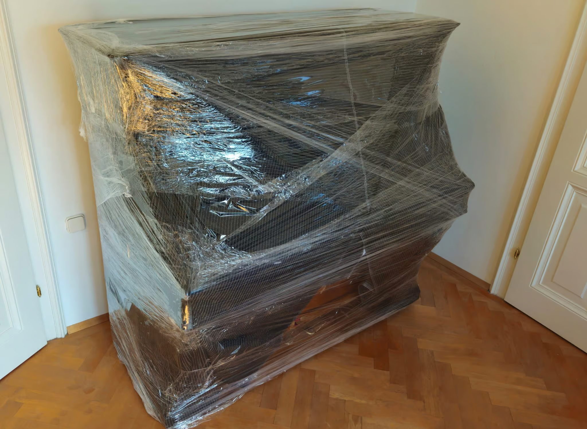Klavier verpackt für den Transport